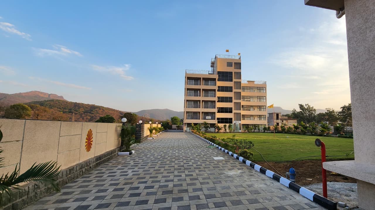 Approach road and main Parasmani building